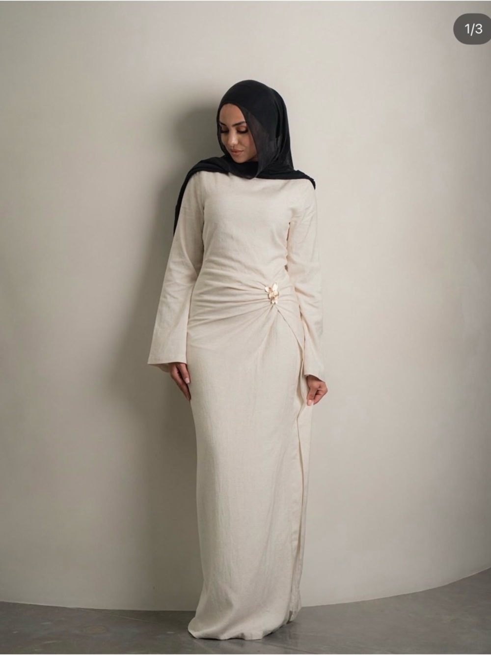 Elegant Cream Ruched Maxi Dress with Gold Butterfly Buckle Detail